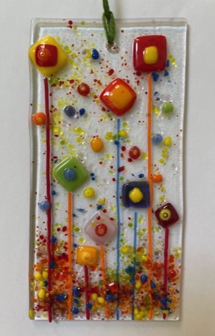 Tall fused glass flower garden panel with colourful blooms
